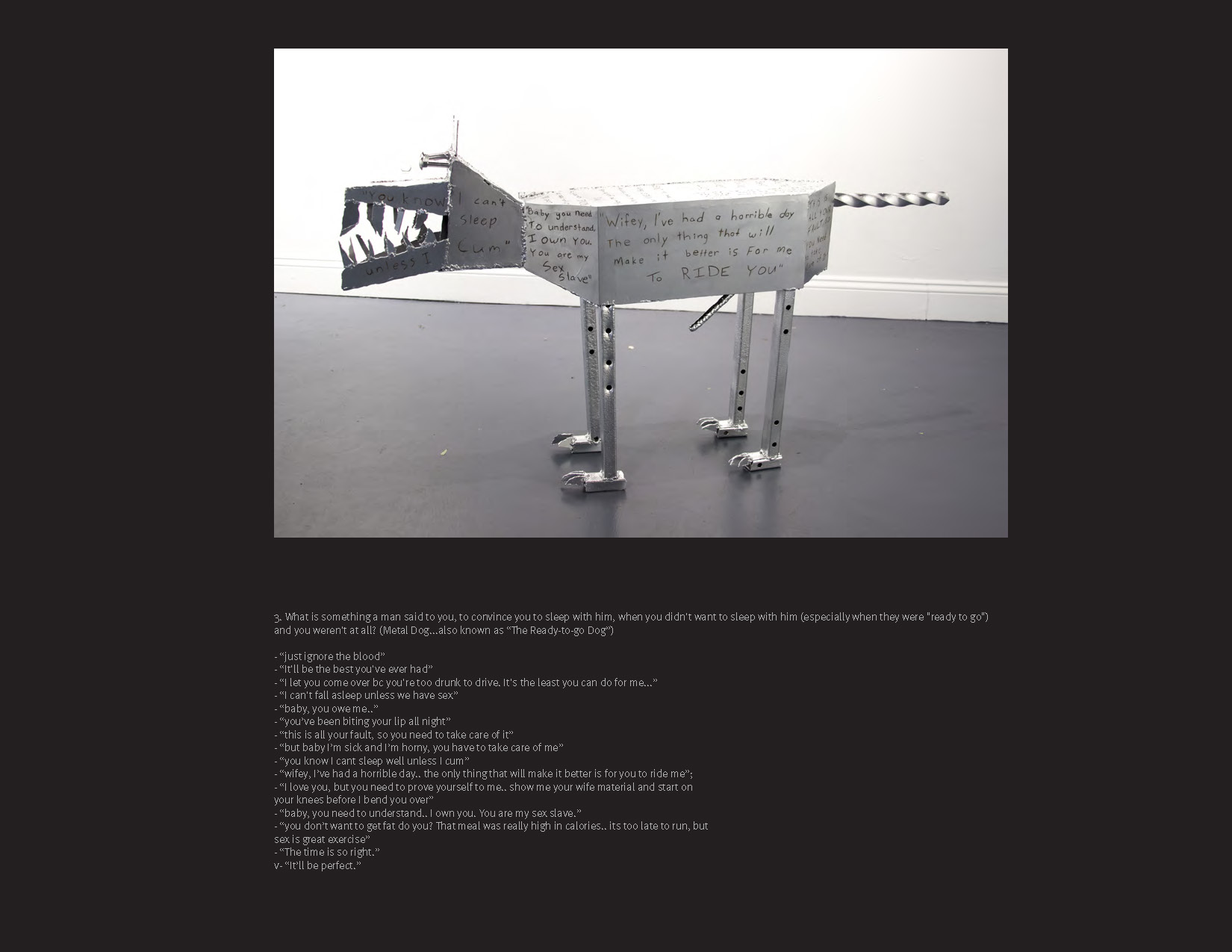A metal sculpture of a dog with text etched into the body.